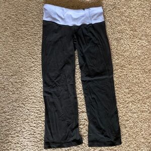 Lululemon Black Cropped Yoga Pants with Lavender Waist Band, Size 2